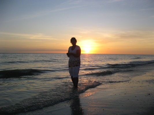 Fruen i solnedgang på Sanibel